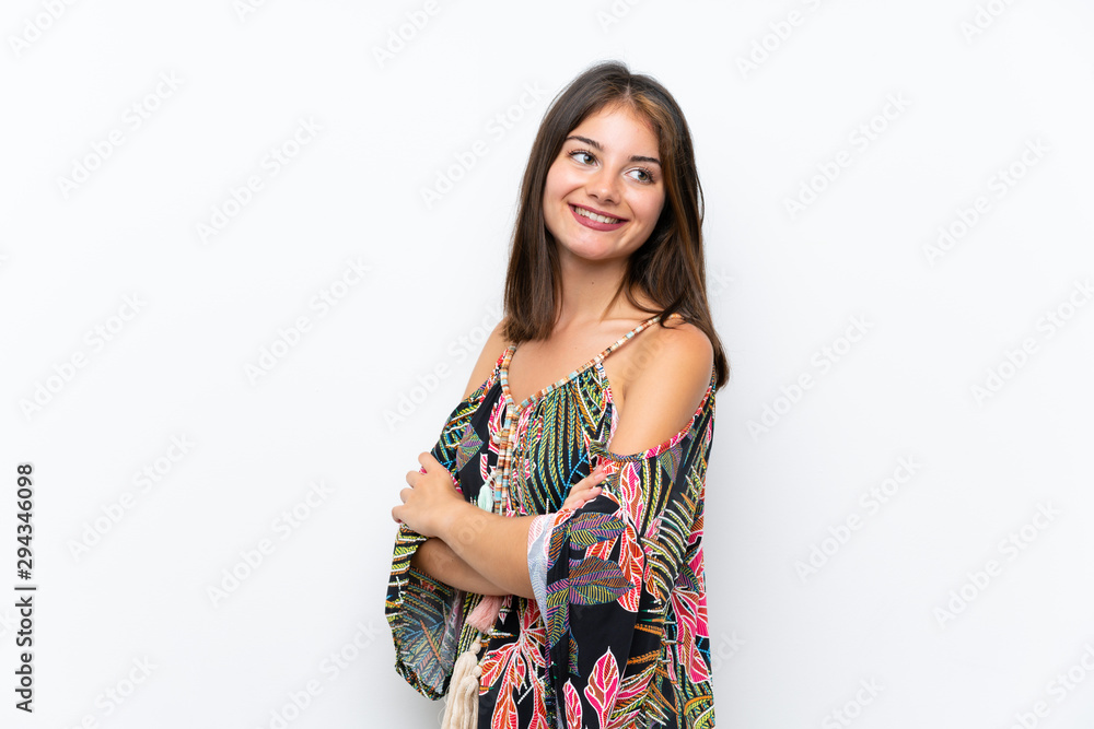 Caucasian young woman in colorful dress on isolated white background laughing Caucasian young woman in colorful dress on isolated white background laughing