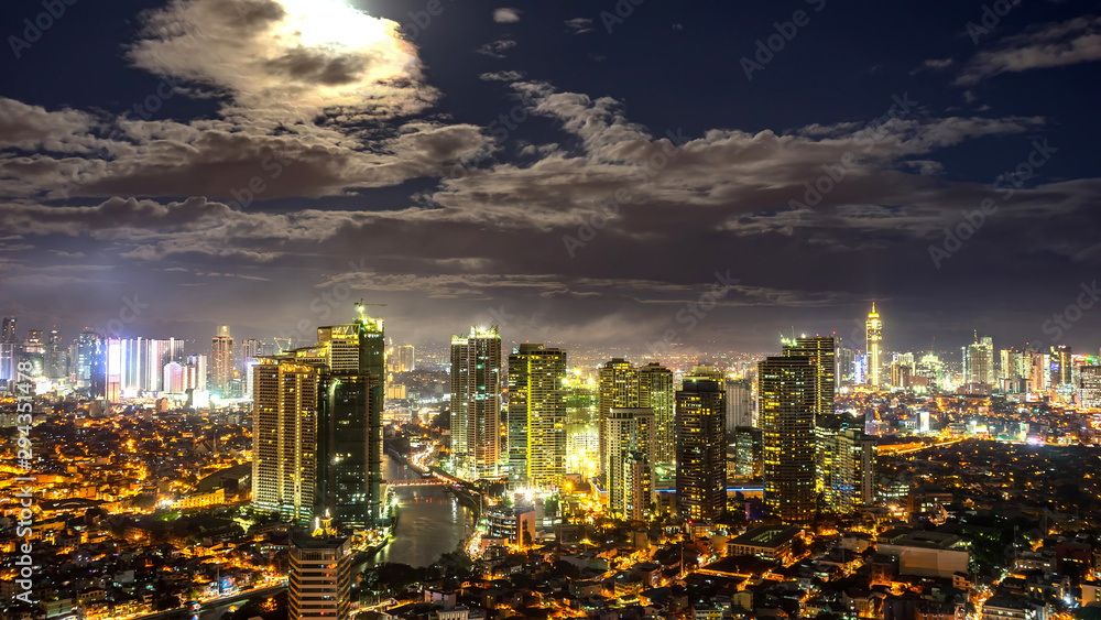 Rising Moon over the skyline of Metro Manila Rising Moon over the skyline of Metro Manila
