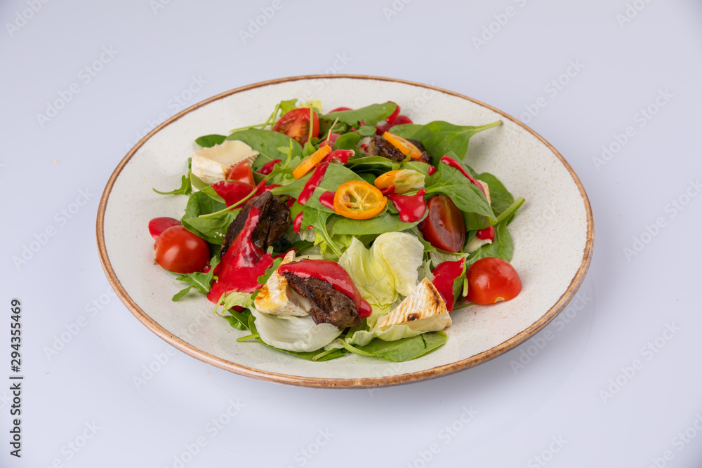 delicious looking tossed chefs salad or antipasto with meat, Camembert cheese and tomato. delicious looking tossed chefs salad or antipasto with meat, Camembert cheese and tomato.