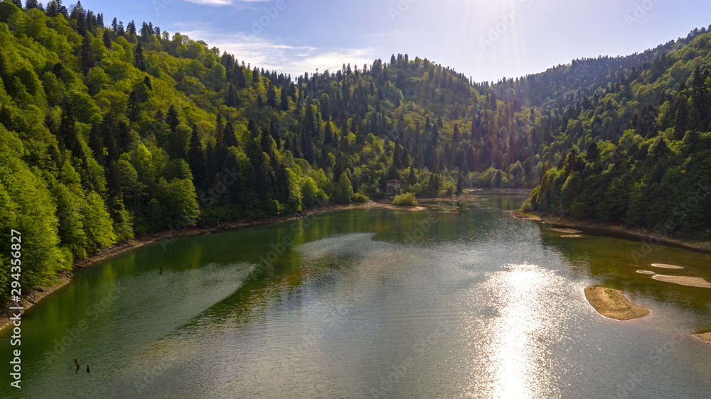 Obraz premium Racha is one of the mountain regions of Georgia. Shaowi Reservoir. Near the town of Ambrolauri. Caucasus Mountains. Spring 2019