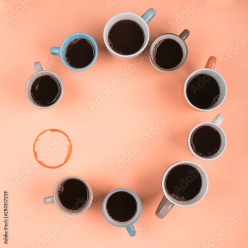 Coffee in the different cups on the pink background. Flatlay, cheerful day concept