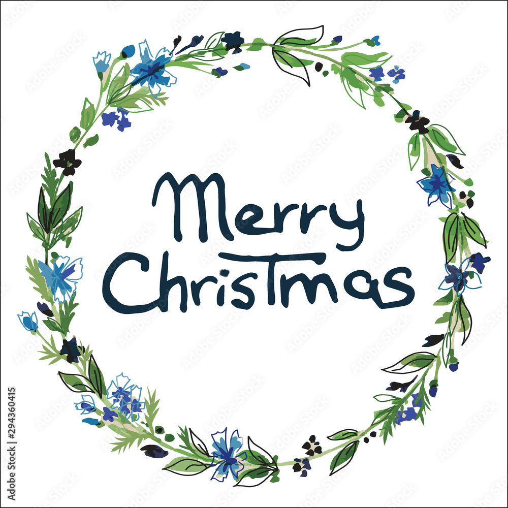 Christmas wreath with blue fowers and lettering.