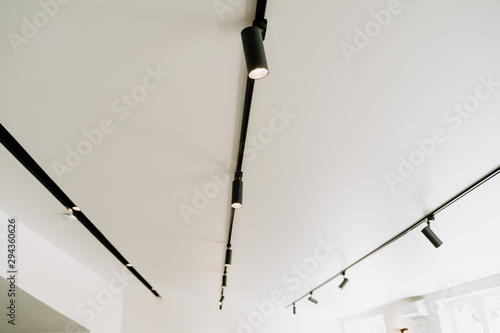 Shine Electrical Led Spot Light on White Ceiling photo