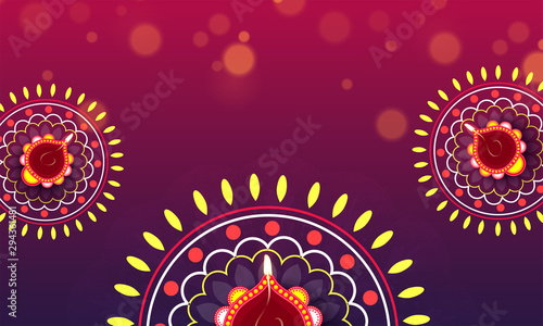 Diwali celebration concept decorated with beautiful floral design and lit lamps on shiny bokeh background.