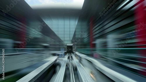 Future city transportation. An autonomous monorail train tracks and fast moving train in speed motion blur zoom effect photo