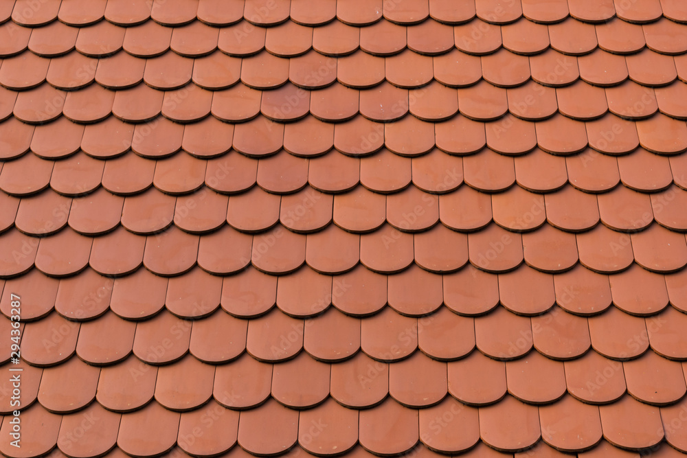detail of new ceramic shingle roof tile background pattern detail of new ceramic shingle roof tile background pattern