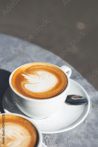 Flat white coffee on the table in the cafe © manuta