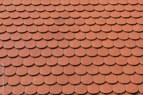 detail of new ceramic shingle roof tile background pattern