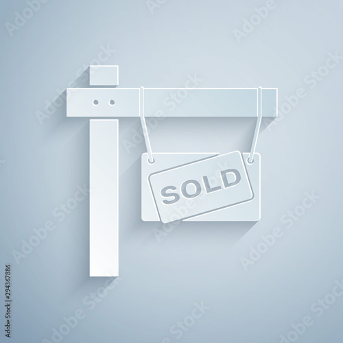 Paper cut Hanging sign with text Sold icon isolated on grey background. Sold sticker. Sold signboard. Paper art style. Vector Illustration
