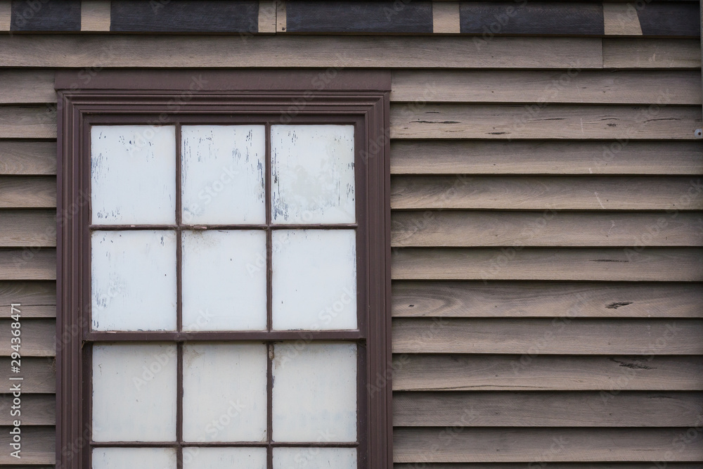 Fototapeta premium Vintage wall with wooden windows