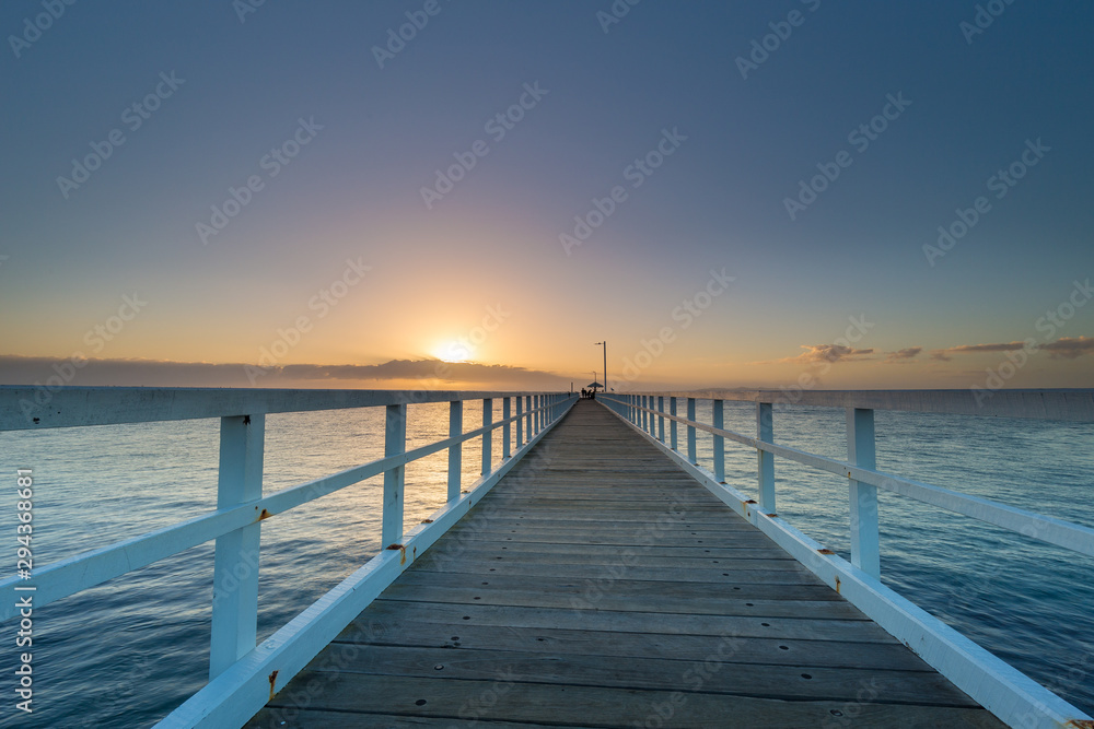 Sunrise at Point Lonsdale Lighthouse and jetty, Bellarine Peninsula, Victoria, Australia.