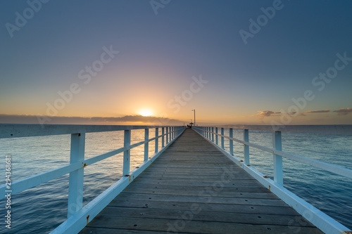 Fototapeta Naklejka Na Ścianę i Meble -  Sunrise at Point Lonsdale Lighthouse and jetty, Bellarine Peninsula, Victoria, Australia.