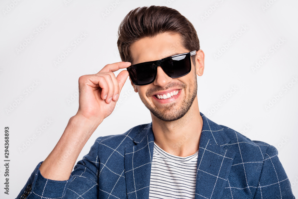 Close-up portrait of his he nice attractive lovely cheerful cheery glad businessman wearing blue checked blazer cool modern outfit touching specs isolated over light white pastel background Close-up portrait of his he nice attractive lovely cheerful cheery glad businessman wearing blue checked blazer cool modern outfit touching specs isolated over light white pastel background