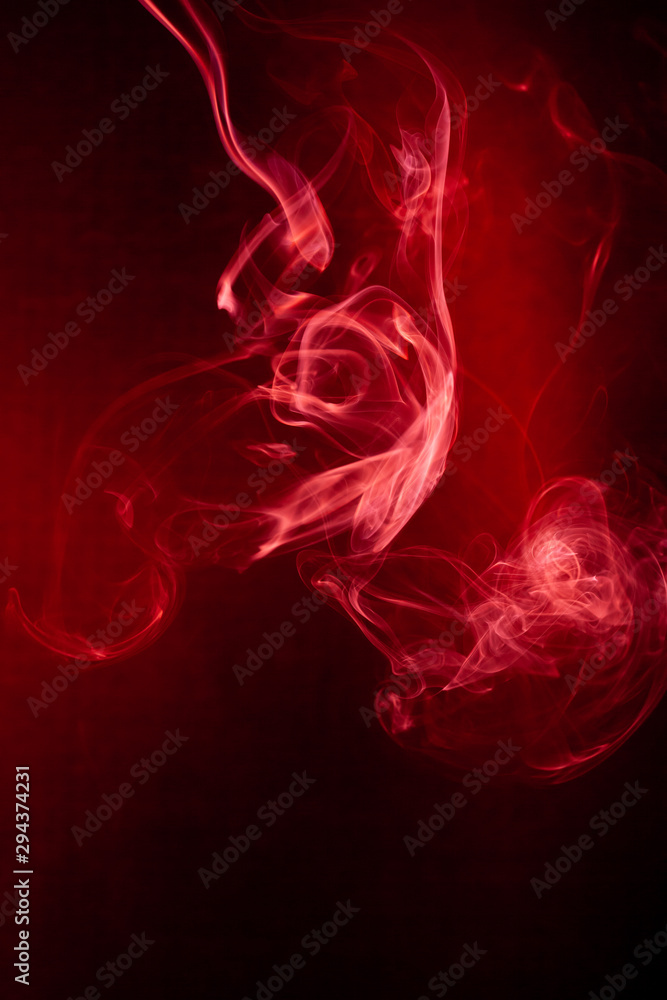 Red smoke motion on black background. Red smoke motion on black background.