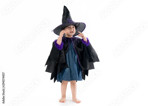 Halloween cute girl wearing witch costume in white background