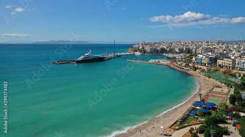 Aerial photo of Piraeus riviera sandy beach next to famous Marina Zeas, Attica, Greece