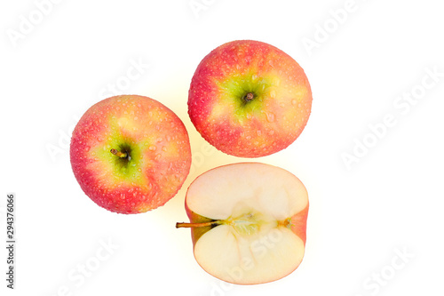 Sliced wet red apples isolated on white background ready to use in designs