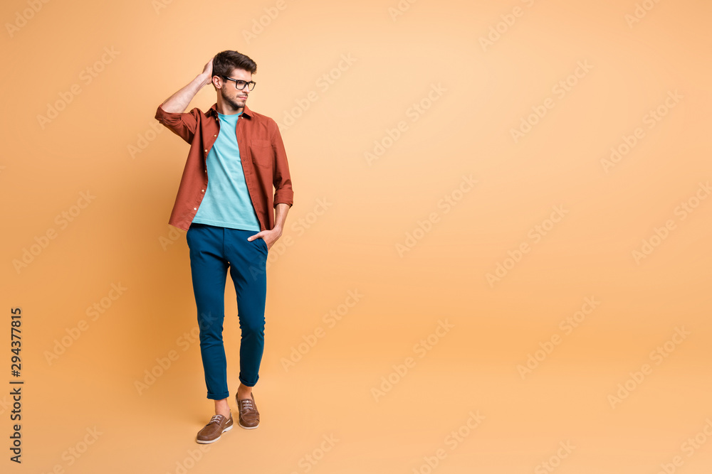 Full length body size view of his he nice attractive content brunette guy business shark expert thinking making career growth decision isolated over beige color pastel background Full length body size view of his he nice attractive content brunette guy business shark expert thinking making career growth decision isolated over beige color pastel background