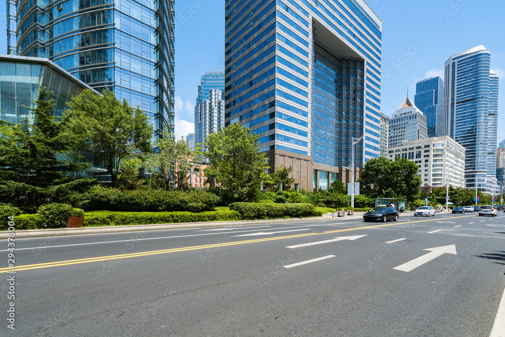 empty highway with cityscape and skyline of qingdao,China.