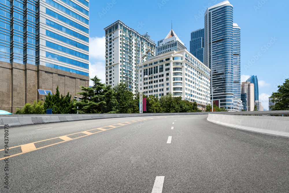 empty highway with cityscape and skyline of qingdao,China. empty highway with cityscape and skyline of qingdao,China.