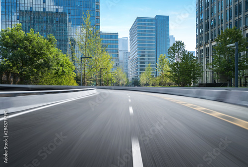 empty highway with cityscape and skyline of qingdao,China.