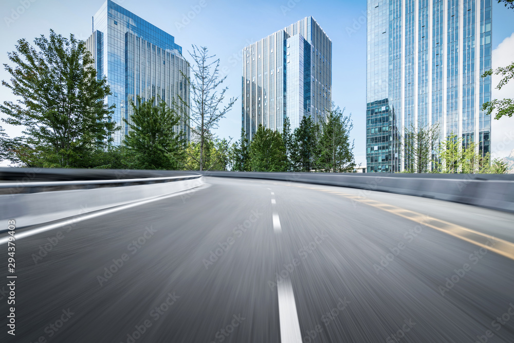 empty highway with cityscape and skyline of qingdao,China.