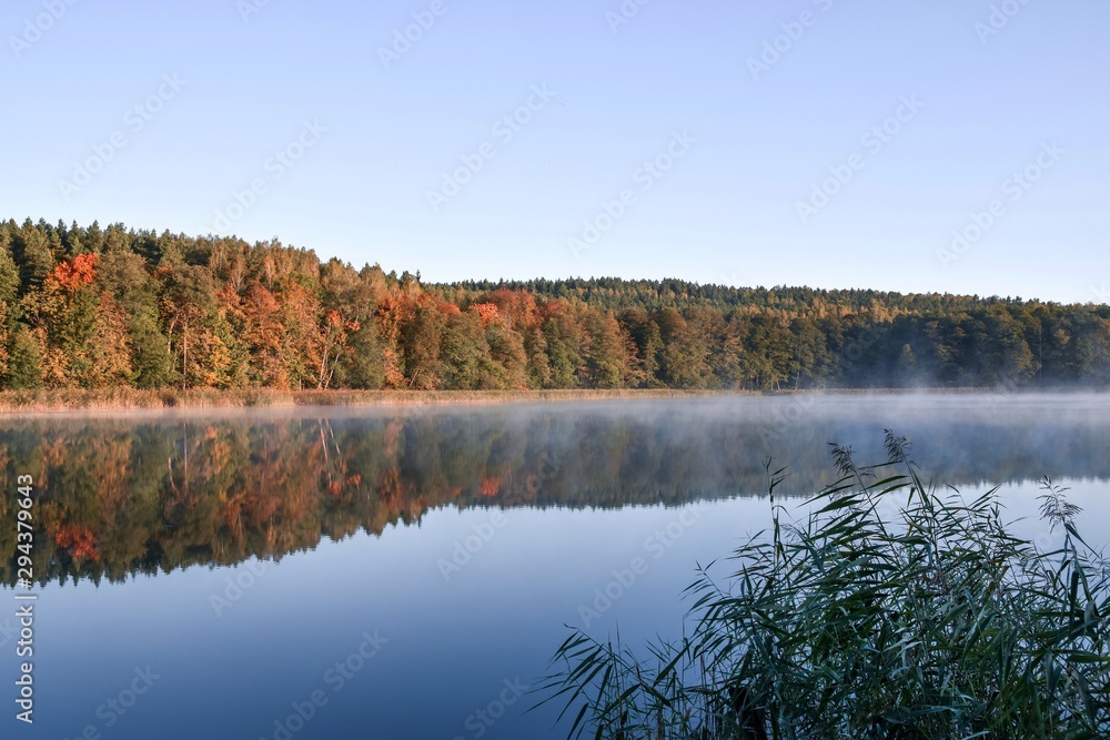 autumn landscape with lake and trees. Wadag Lake