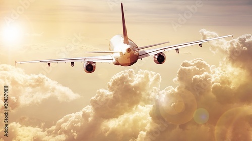 modern airliner over the cl...