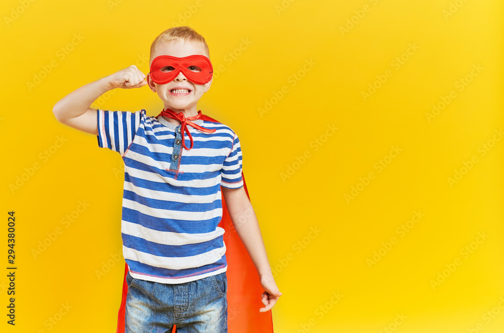 Strong boy in superhero costume Strong boy in superhero costume