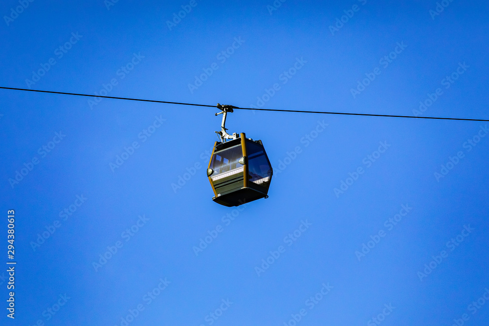 Cable car flying on the mountain. Cable car flying on the mountain.