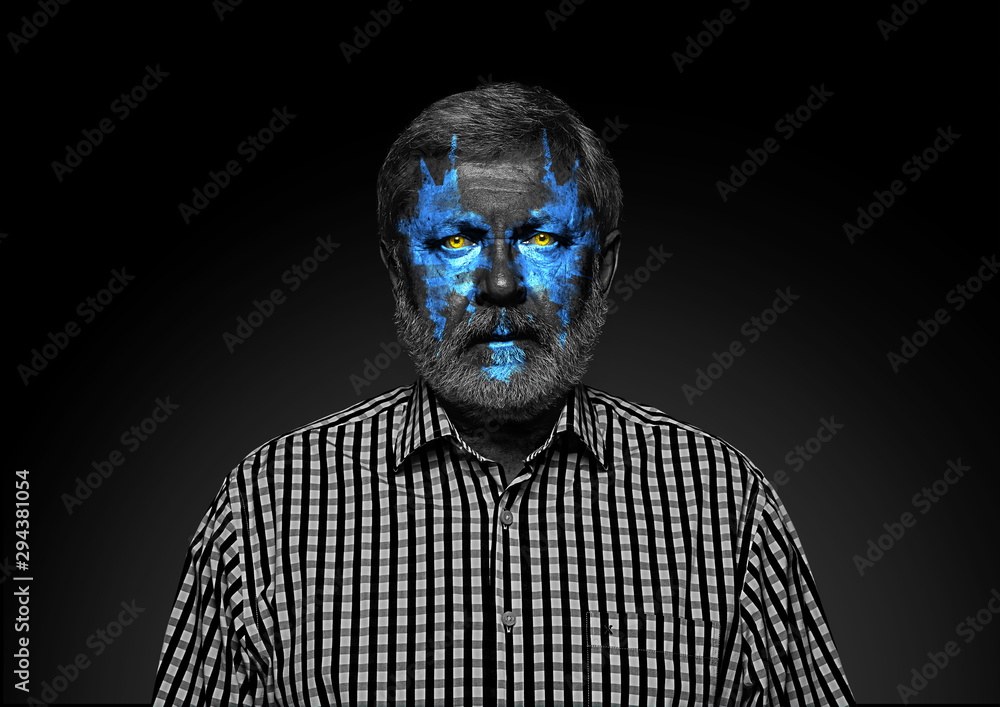 Discover what's inside you. Close up portrait of senior man isolated on black studio background. Bright neon light on the face. Halloween, scary look theme, october holidays, horror concept. Discover what's inside you. Close up portrait of senior man isolated on black studio background. Bright neon light on the face. Halloween, scary look theme, october holidays, horror concept.