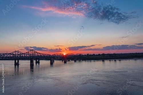 Orange sunset over the Mississippi river © hegearl