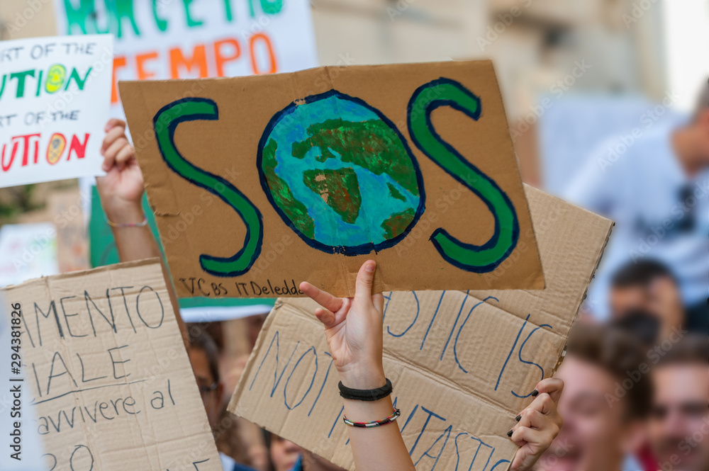 Fridays for future: students hands showing  banners and boards - obrazy, fototapety, plakaty 