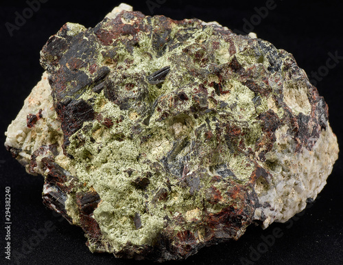 Manganoneptunite. The mineral forms dark red prismatic crystals up to 7 cm in length.