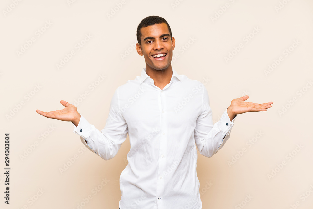 Young handsome brunette man over isolated background with shocked facial expression Young handsome brunette man over isolated background with shocked facial expression