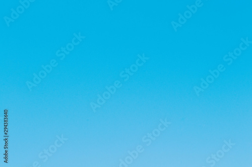 Blue beautiful cloudless sky background photo