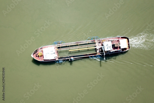 Top view of cargo shep in the river
