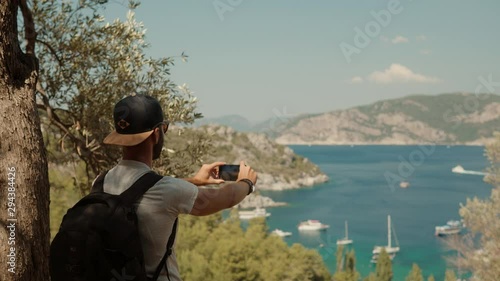 Wallpaper Mural Mobile Photo.Picture On Smartphone.Man Taking Mobile Photo.Man Holding Mobile Phone Taking Picture At Sunset.Close Up Attractive Male Happy Using Mobile App For Photo Or Video. Torontodigital.ca