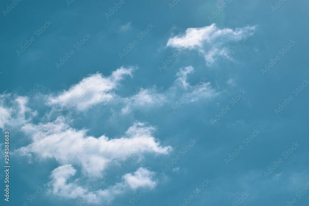 White clouds, on the blue sky, background White clouds, on the blue sky, background