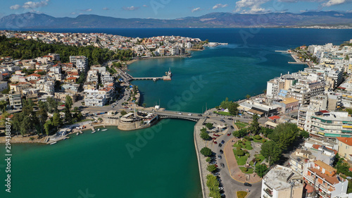 Aerial top view photo of famous old steel bridge of Halkida or Chalkida connecting mainland with Evia island, Greece