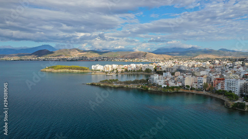 Aerial photo of famous seaside town of Halkida with beautiful clouds and deep blue sky, Evia island, Greece