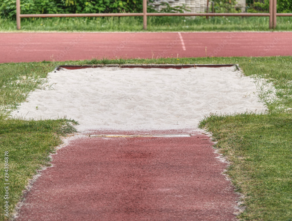 White lane for the long jump. Sandy red retrack white ake-off board. White lane for the long jump. Sandy red retrack white ake-off board.