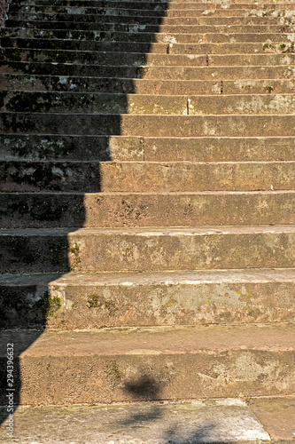 historical worn sandstone steps near a castle in the odenwald