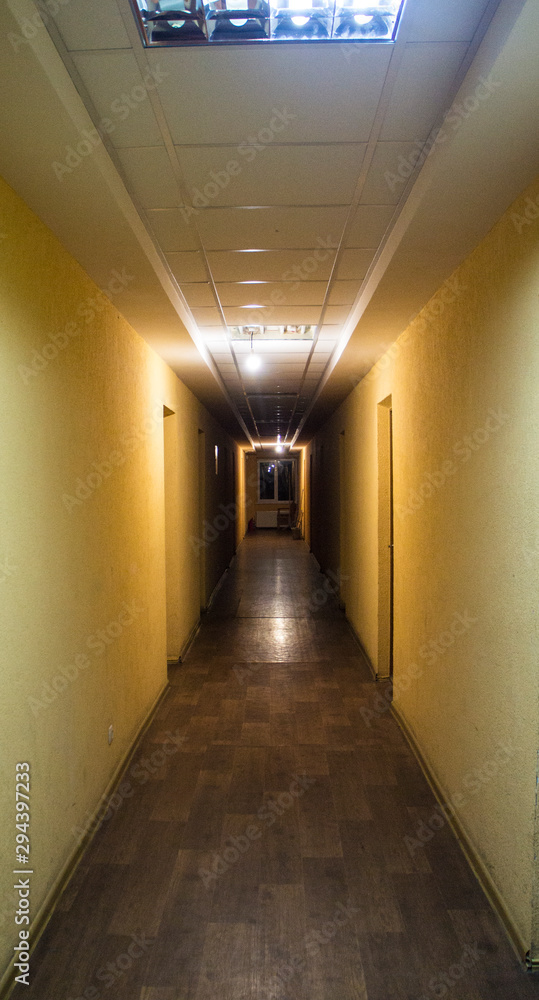 Empty corridor in the hotel in the evening.