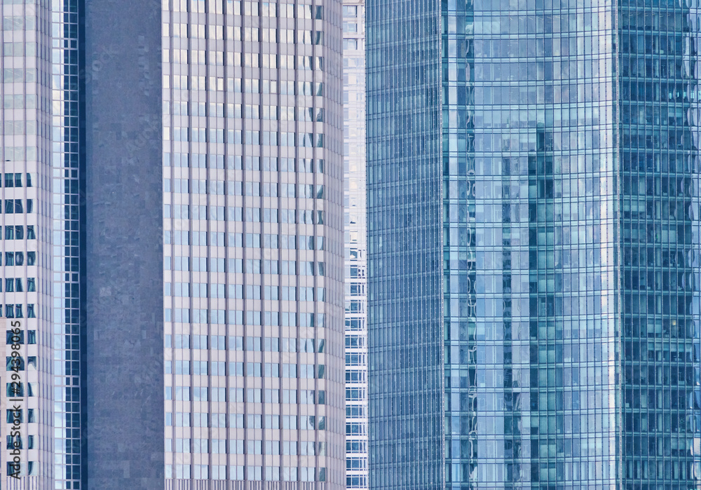 Abstract image of the glass front of a skyscraper with a strict right-angled geometric pattern