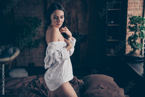 Fotografie Profile photo of tender model lady standing knees on bed linen half naked waitin