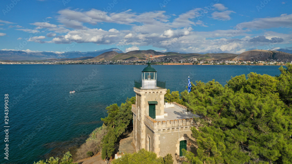 Aerial drone photo of iconic lighthouse built in small islet in famous city of Halkida or Chalkida with clear water seascape and beautiful sky - clouds, Evia island, Greece