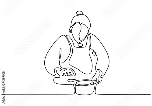 Woman cooking food continuo...