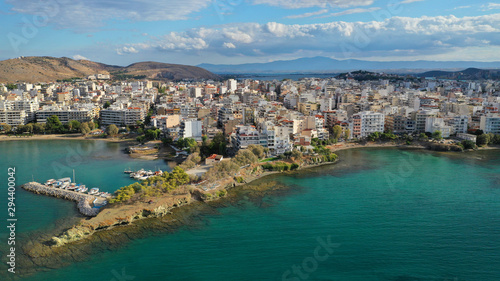 Fototapeta Naklejka Na Ścianę i Meble -  Aerial photo of famous seaside town of Halkida with beautiful clouds and deep blue sky, Evia island, Greece