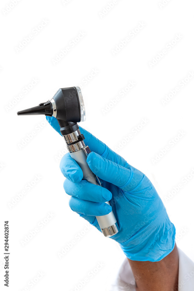 African, American doctor showing copper coil device UD on his office African, American doctor showing copper coil device UD on his office